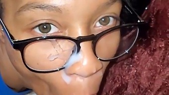 A Black Woman Gets Covered In Cum On Her Face