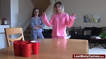 Adult Video Featuring Strip Game With Losing Participant Giving Oral To Winning Player